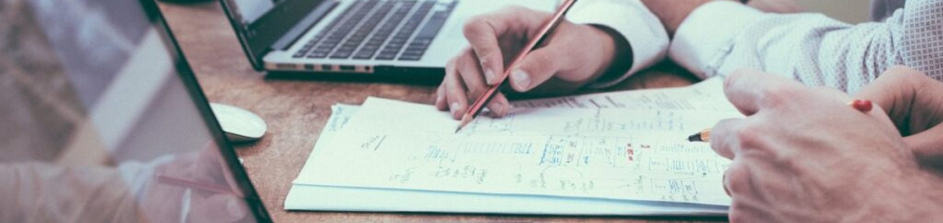 Brainstorming over paper. Original public domain image from Wikimedia Commons